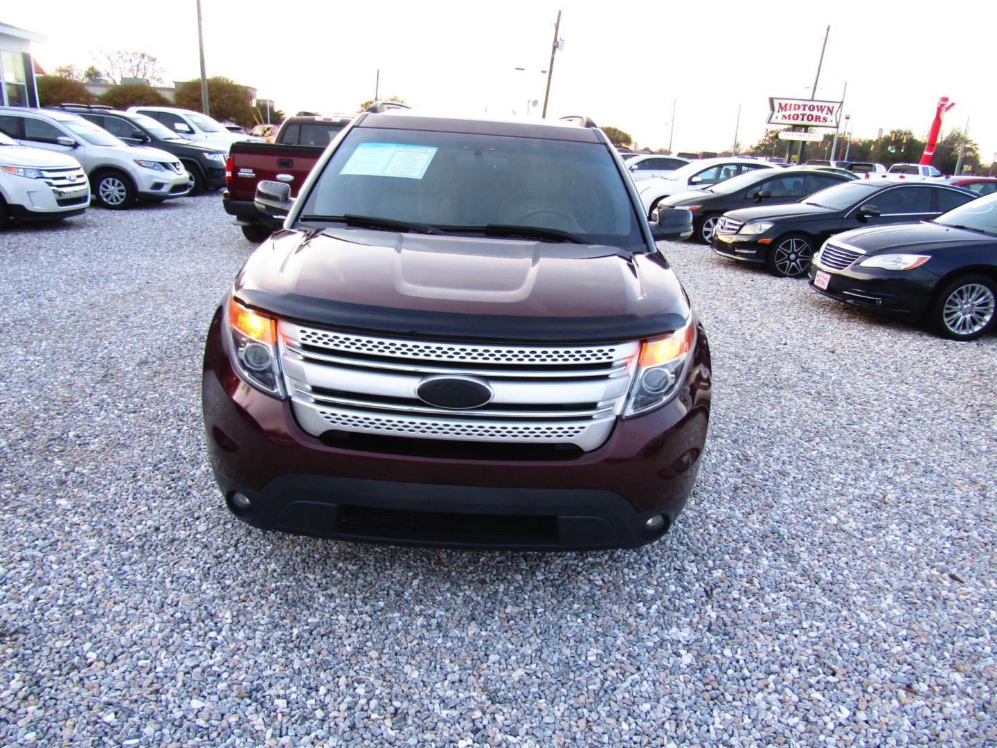 2012 Maroon /Tan Ford Explorer (1FMHK7D8XCG) , Automatic transmission, located at 15016 S Hwy 231, Midland City, AL, 36350, (334) 983-3001, 31.306210, -85.495277 - Photo#1